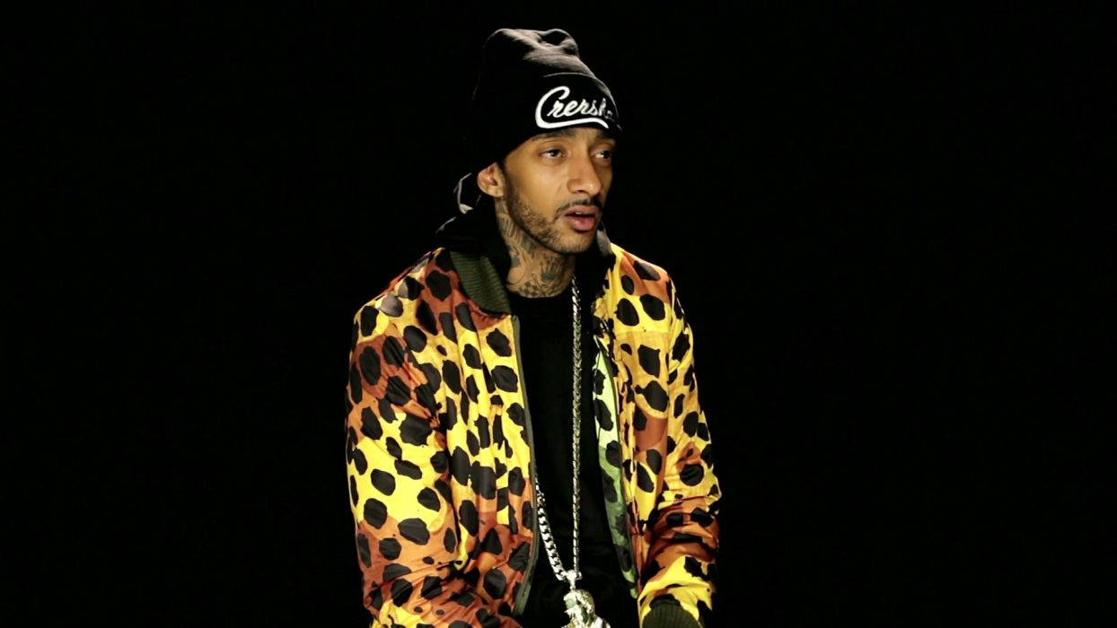 Nipsey Hussle In Cheetah Print Wallpaper