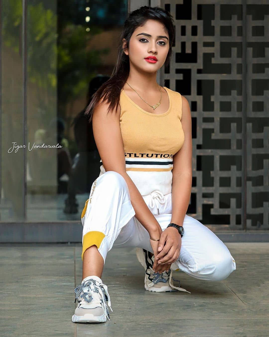 Nisha Guragain Wearing Yellow Sleeveless Top Wallpaper