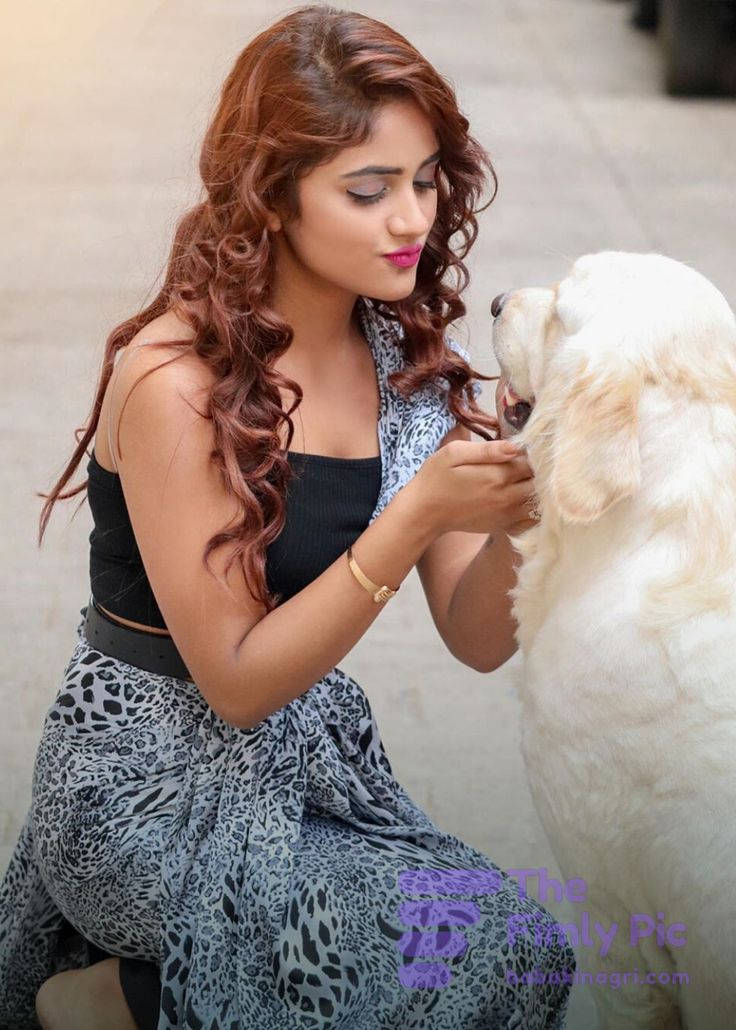 Nisha Guragain With A White Dog Wallpaper