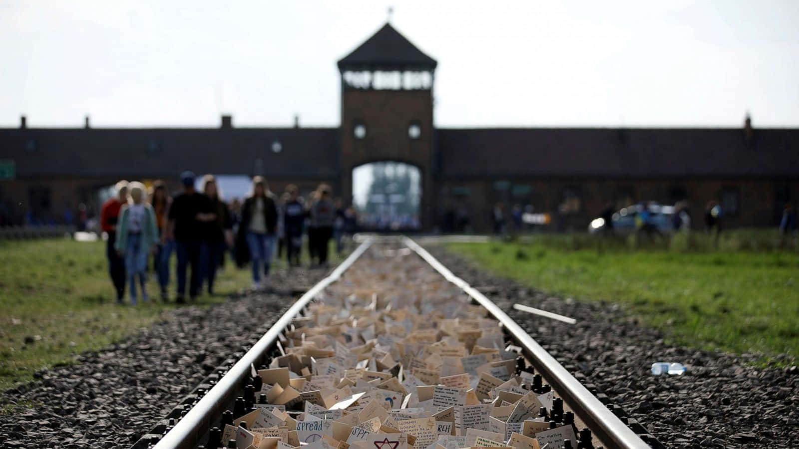 Notable Auschwitz Tracks Covered With Notes Wallpaper