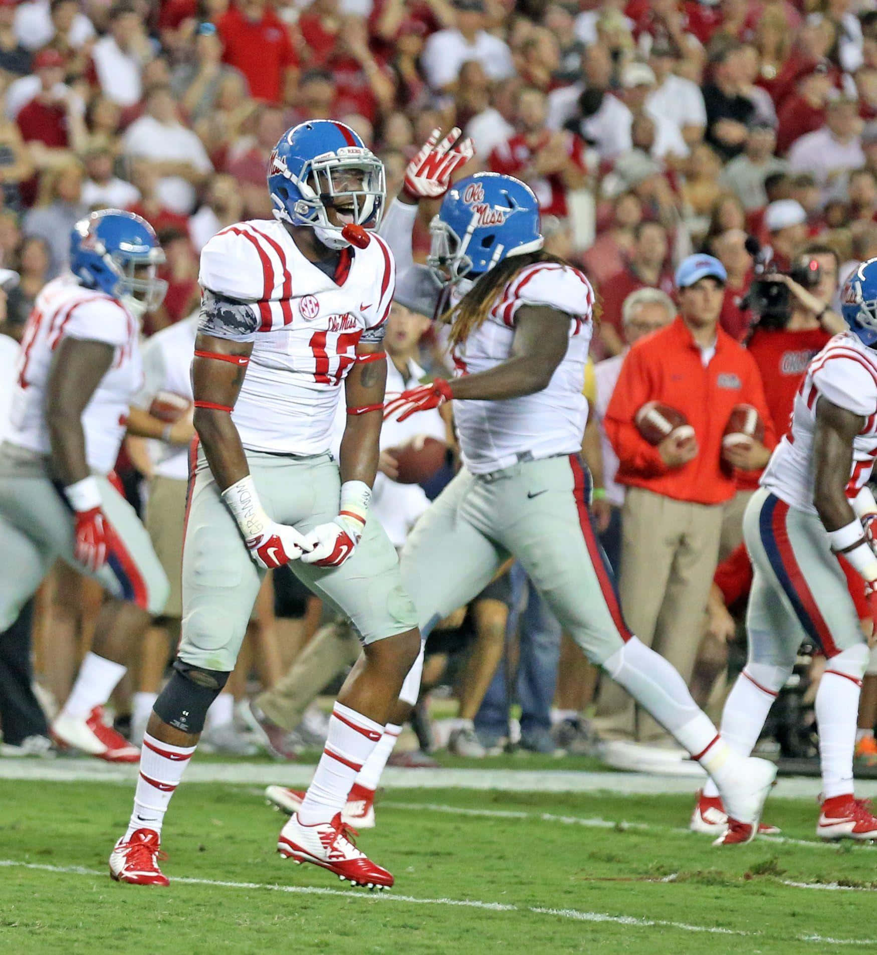 Ole Miss Football Players Celebrating Wallpaper