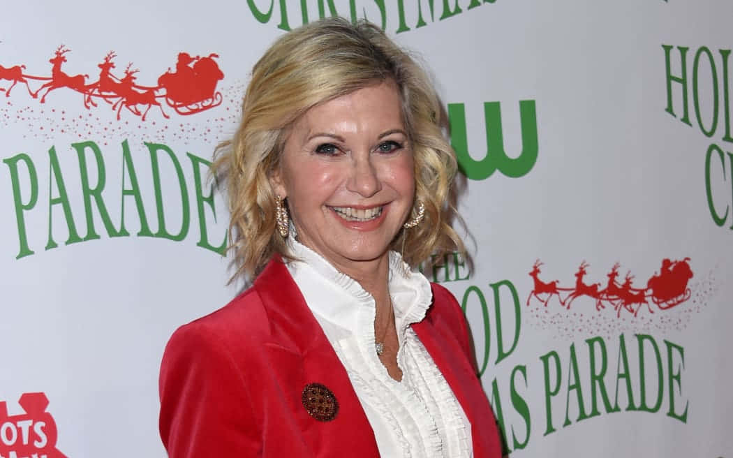 Olivia Newton John Is An Actress, Singer And Environmental Activist Wallpaper