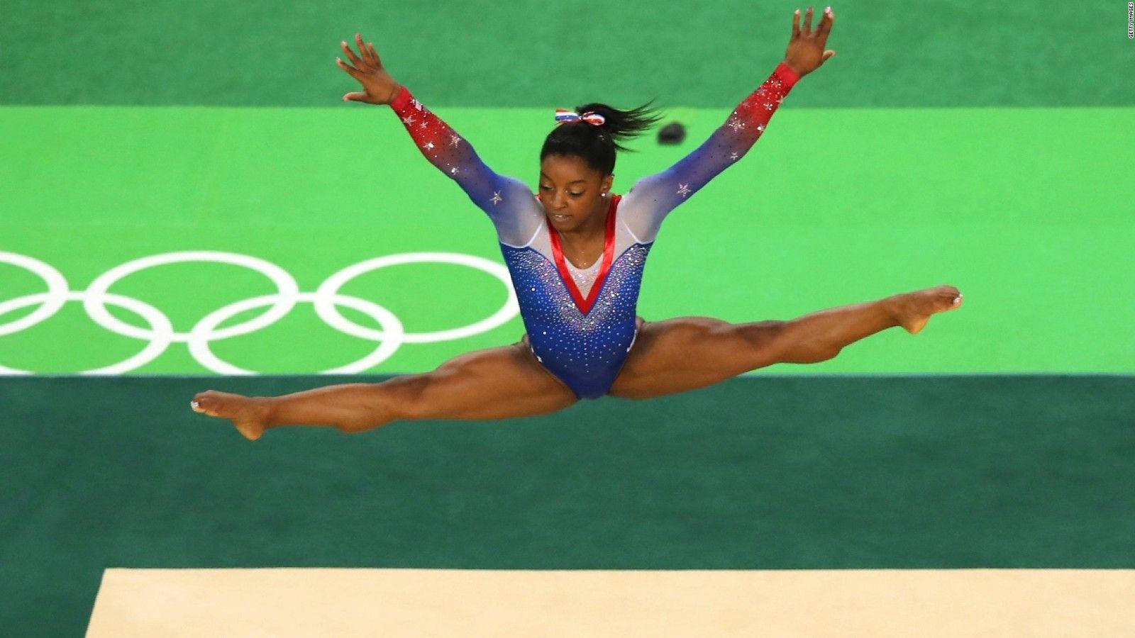 Olympian Simone Biles Airborne Wallpaper