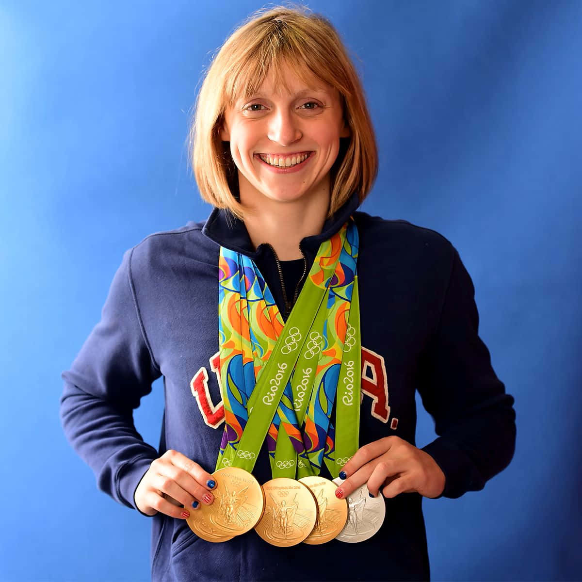 Olympic Swimmer With Medals Wallpaper