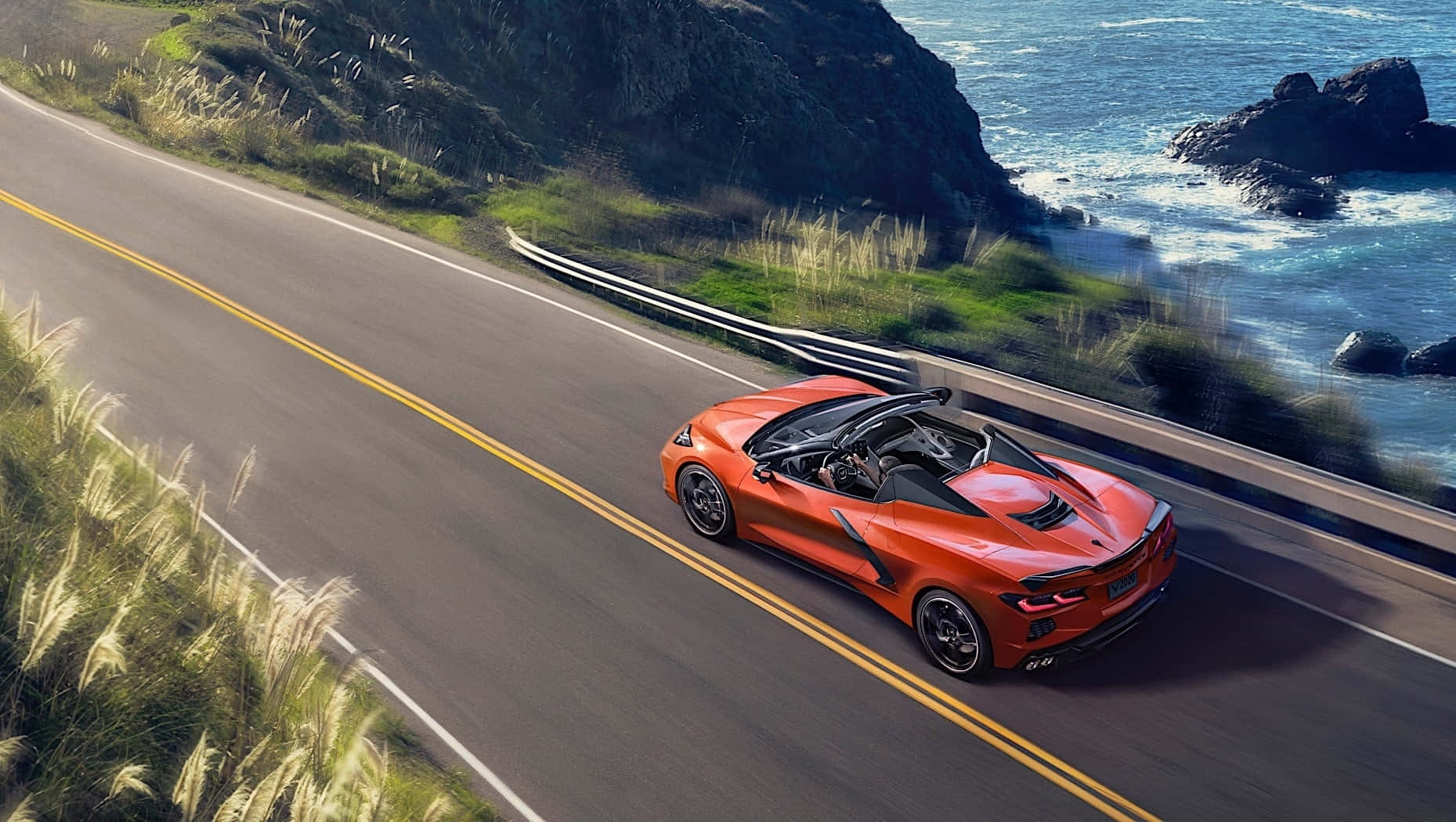 Orange Corvette C8 Convertible Coastal Drive Wallpaper