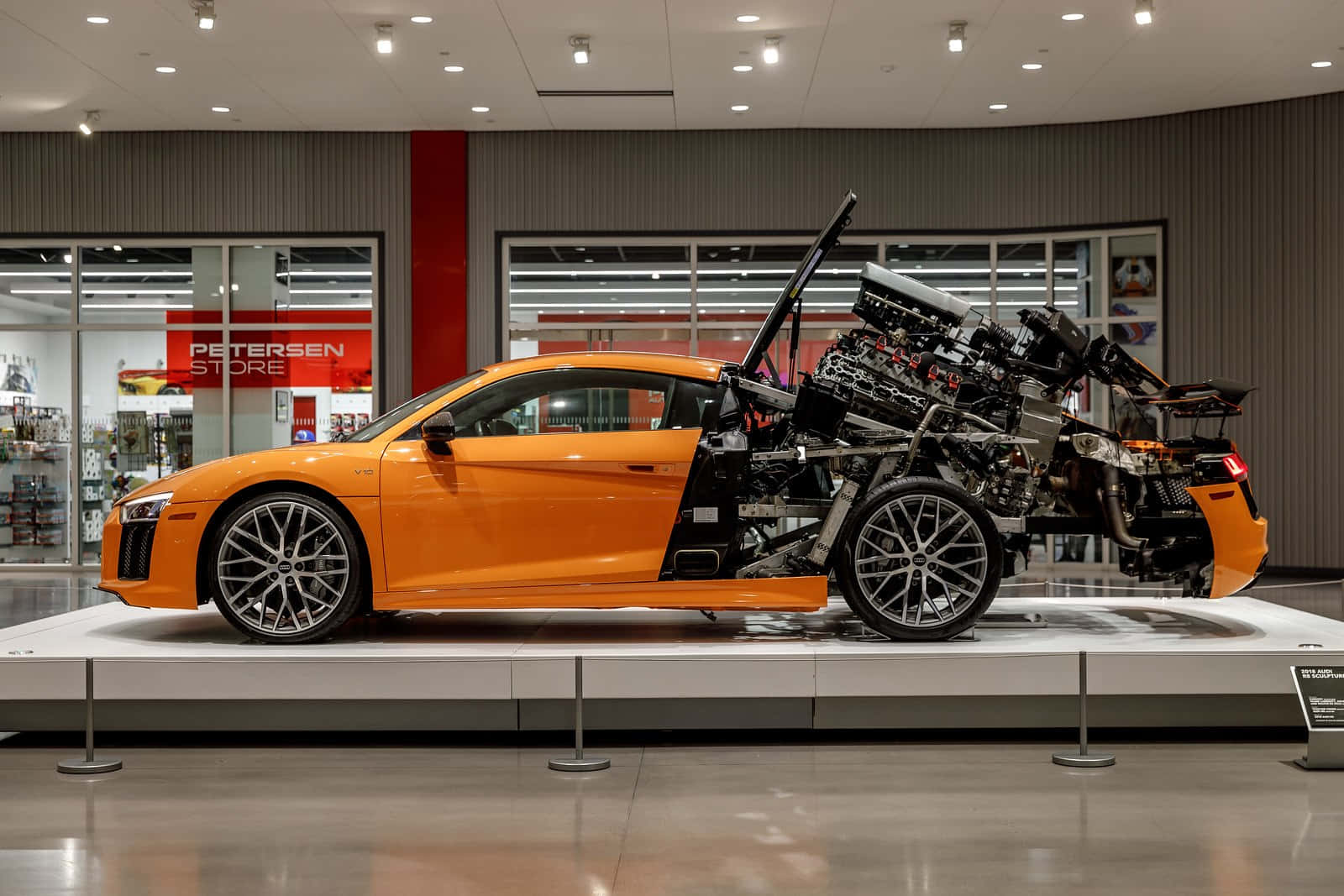 Orange Sports Car Exhibit Petersen Museum Wallpaper