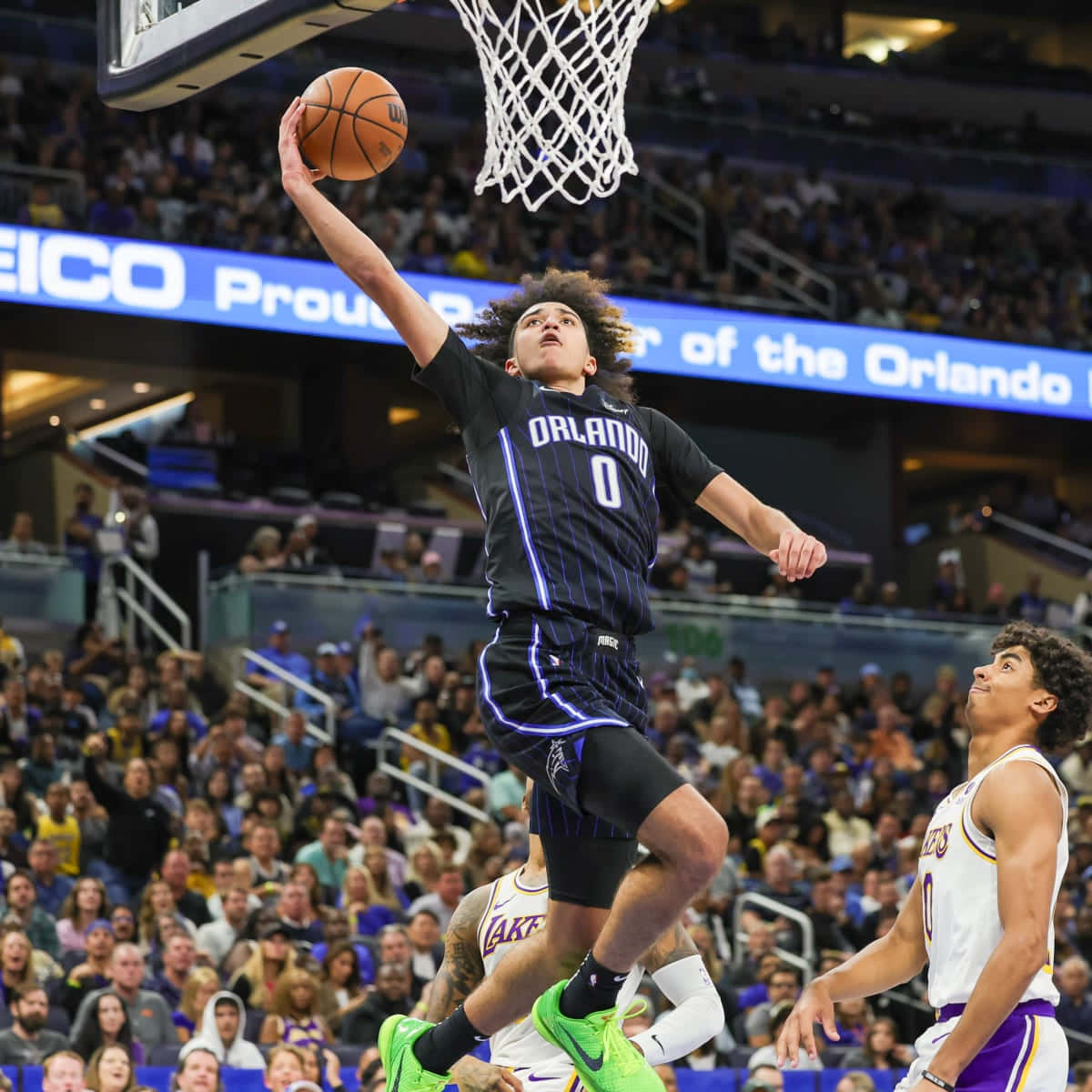 Orlando_ Player_ Dunk_ Attempt_ Basketball_ Game Wallpaper