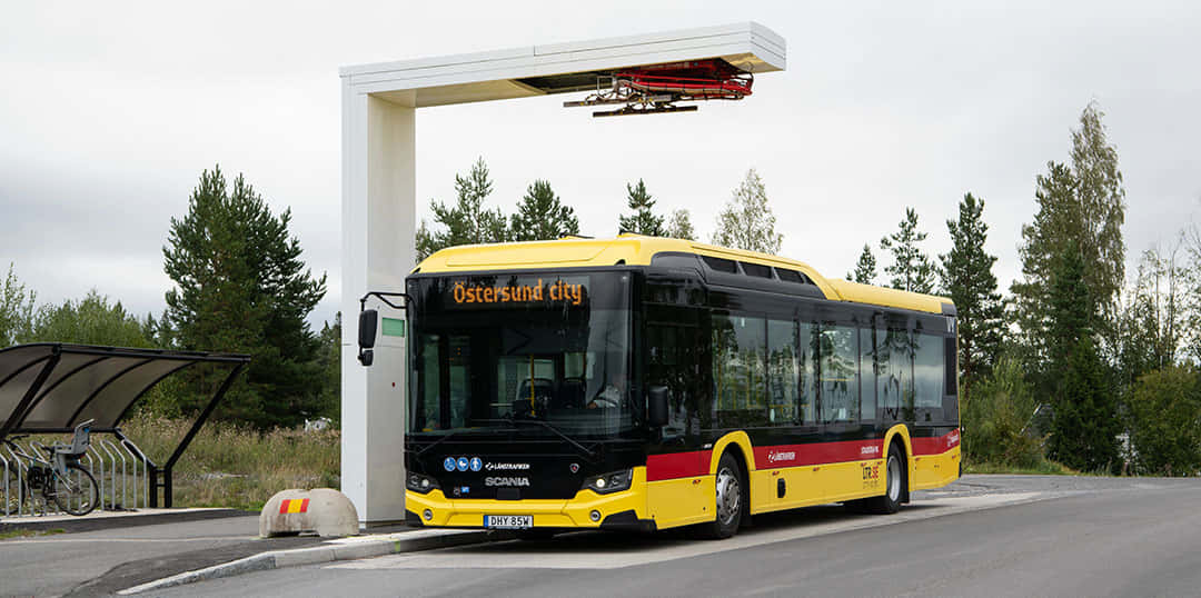 Ostersund City Yellow Bus At Station Wallpaper