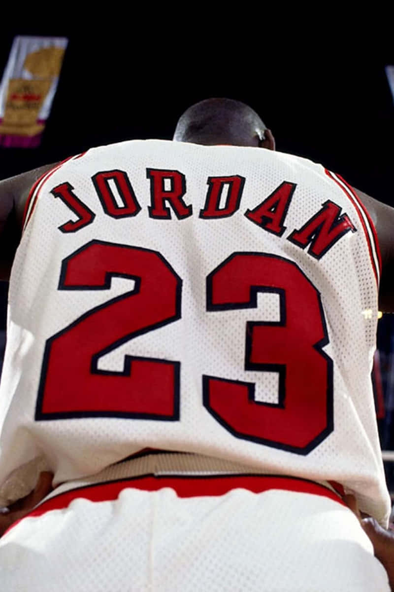 Own A Piece Of Basketball History With An Authentic Michael Jordan Jersey. Wallpaper