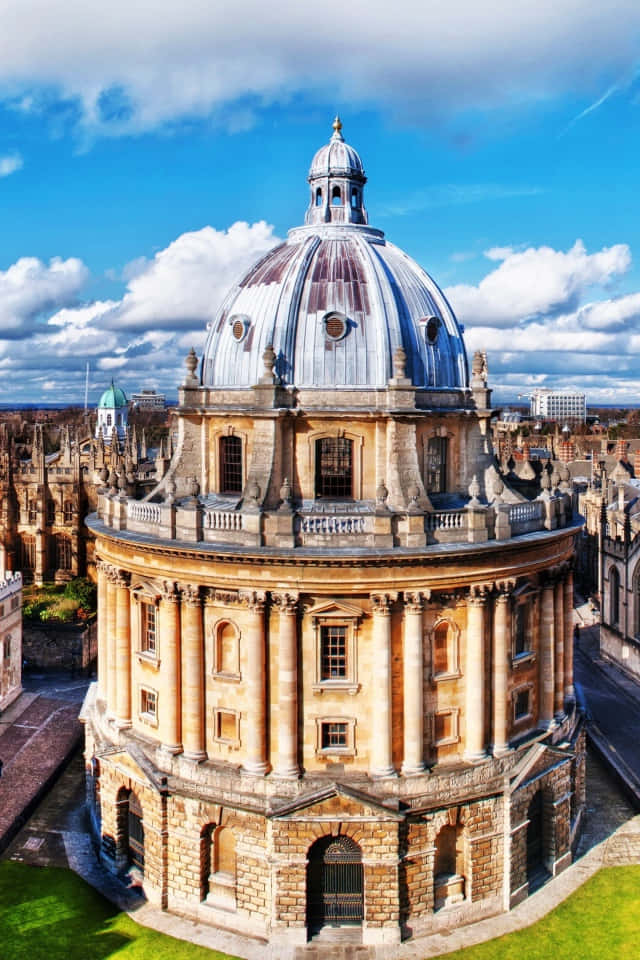 Oxford University With Radcliffe Camera Under Sunshine Wallpaper