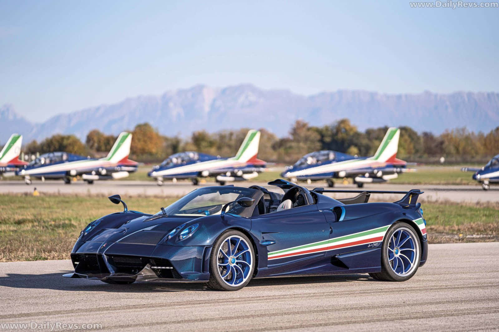 Pagani Zonda Tricolore Gliding Down The Street In All Its Majesty Wallpaper