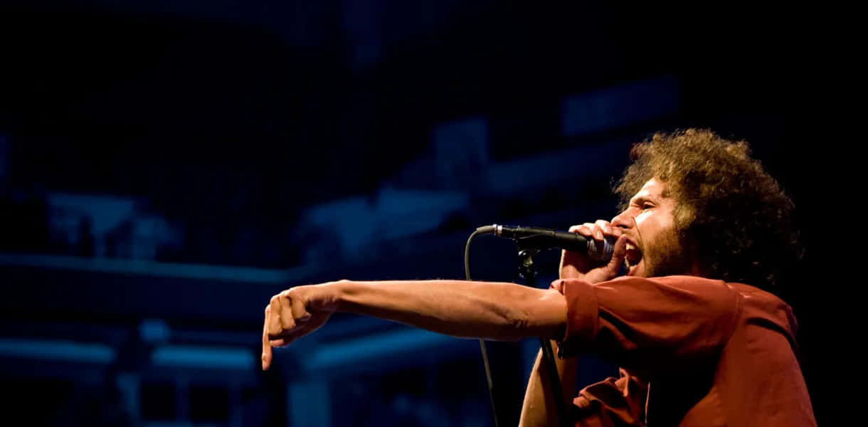 Passionate Performance Zack De La Rocha Wallpaper