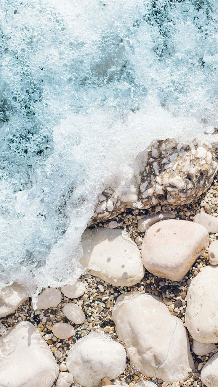 Pastel_ Beach_ Waves_and_ Pebbles.jpg Wallpaper