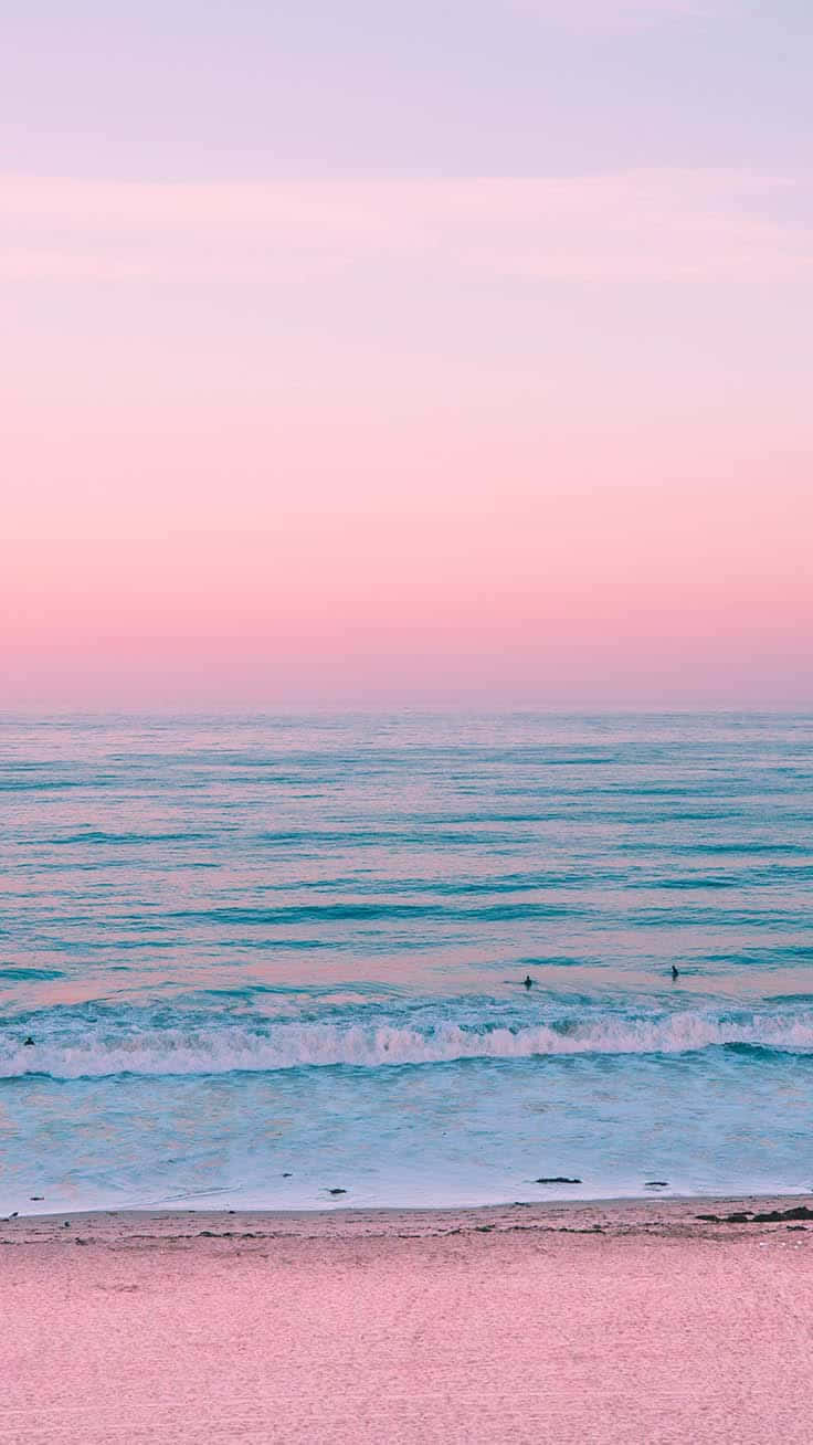 Pastel Sunset Beach Surfers.jpg Wallpaper