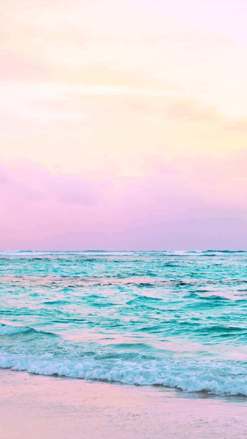 Pastel Sunset Beach Waves Wallpaper