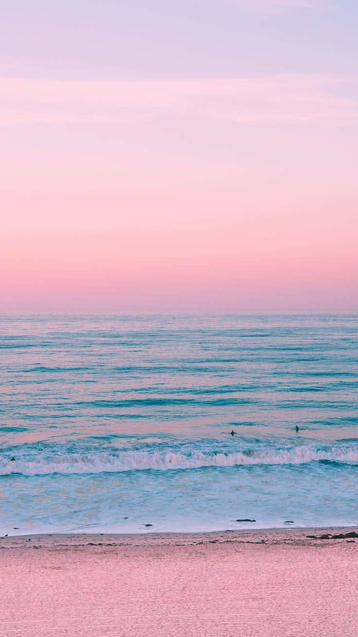 Pastel Sunset Surfers Beach Wallpaper