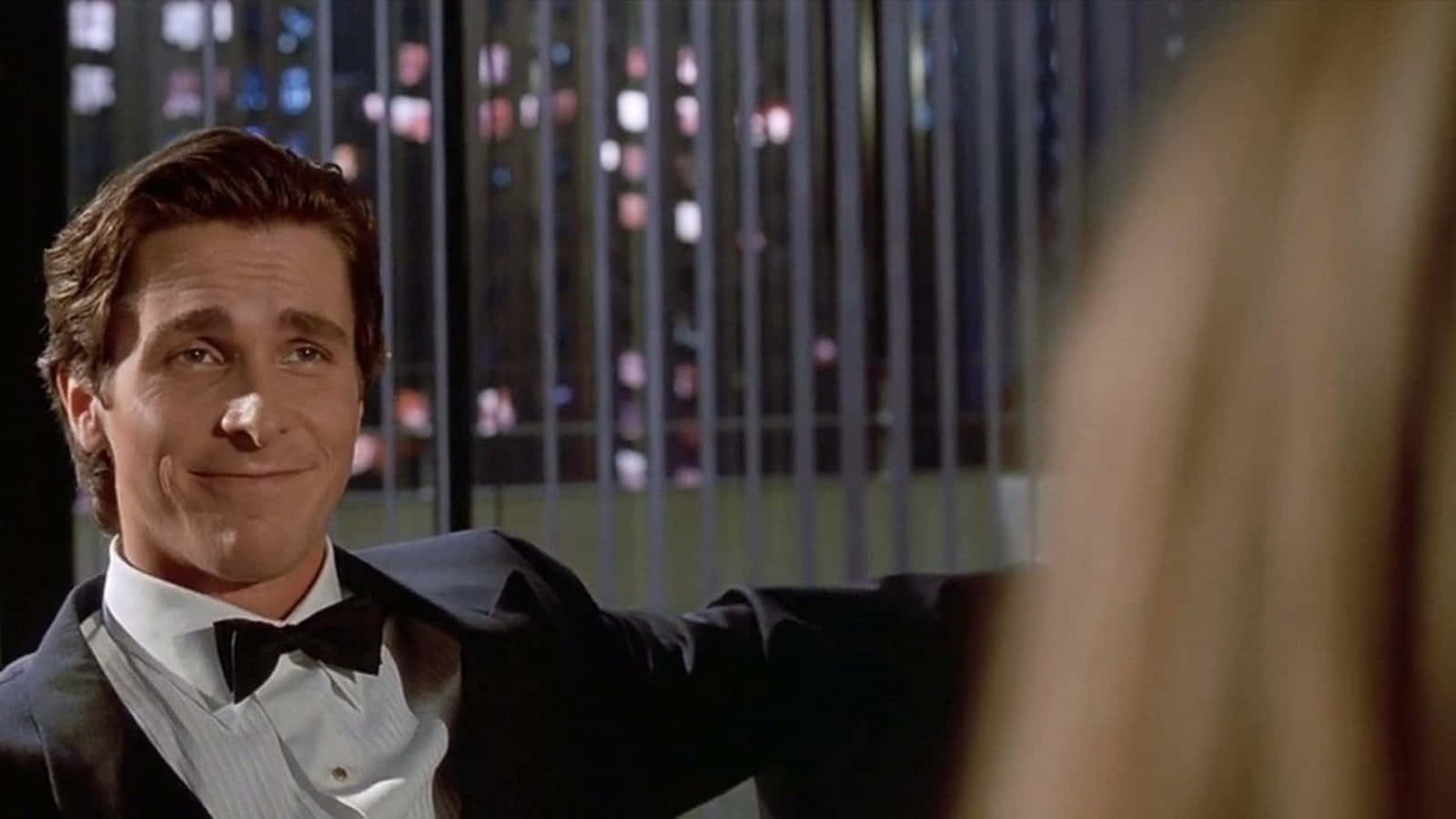 Patrick Bateman Smiling Tuxedo Wallpaper