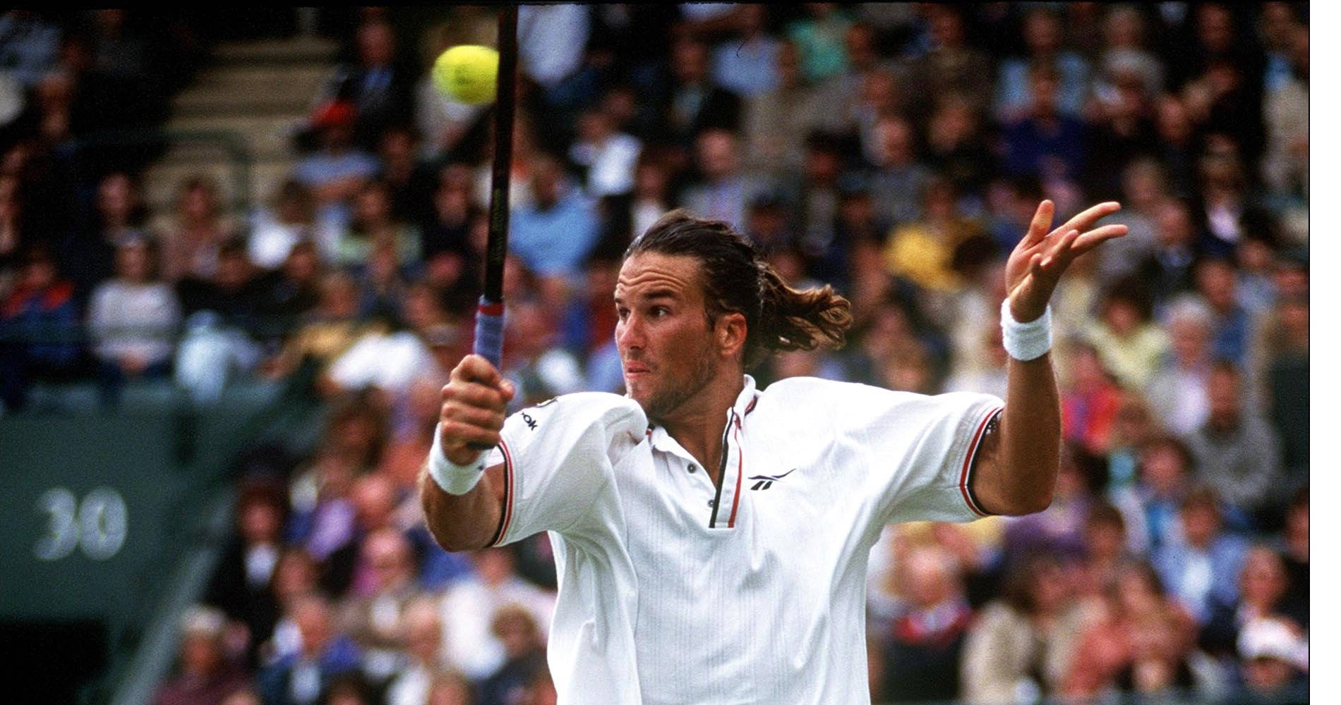 Patrick Rafter Executing A Powerful Backhand Shot Wallpaper