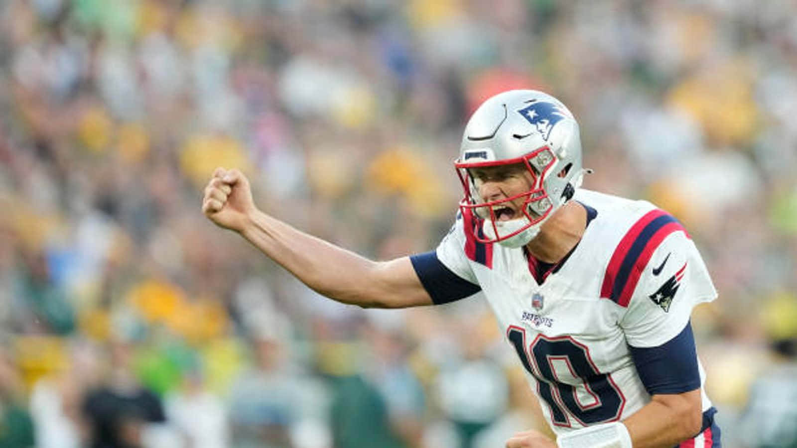 Patriots Player Celebratingon Field Wallpaper