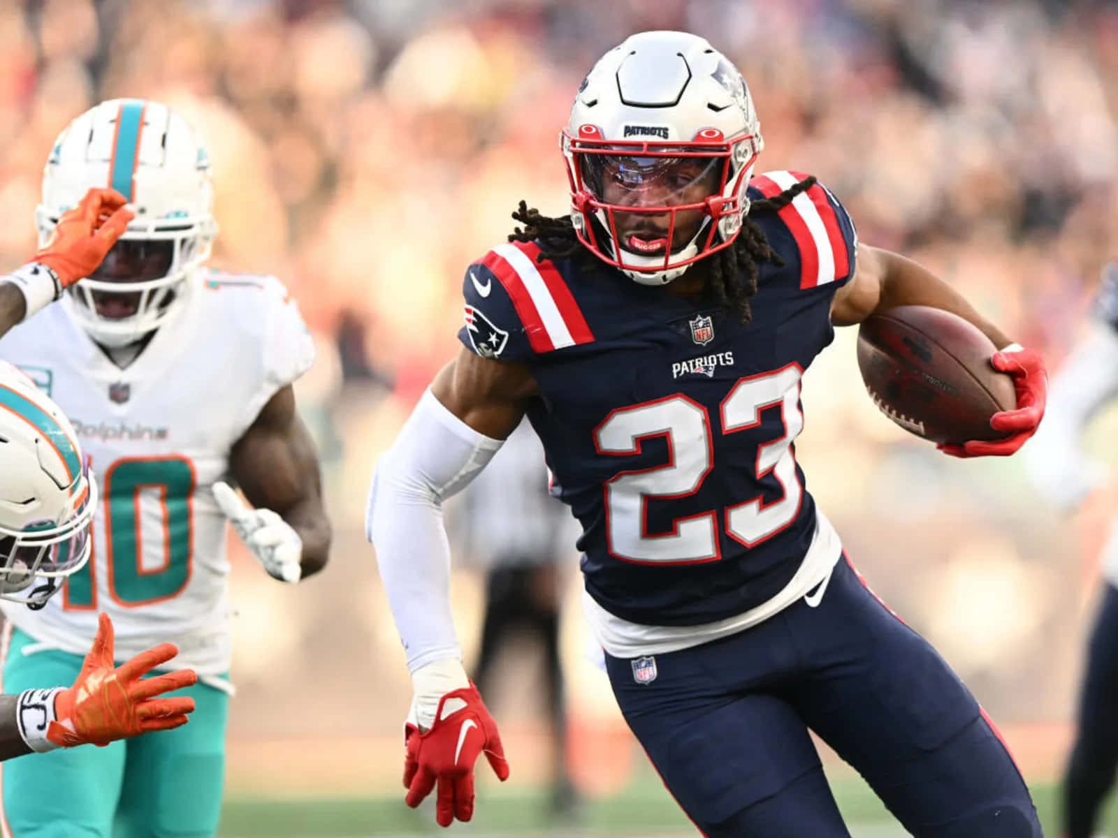 Patriots Player Running With Football Wallpaper