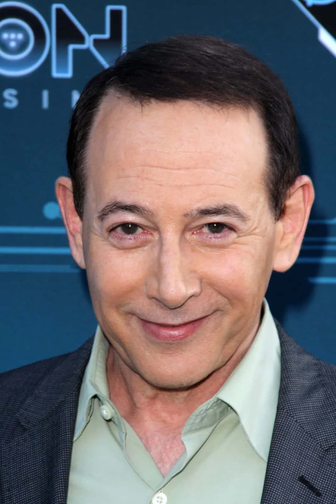 Paul Reubens Wearing A Vintage Striped Shirt Wallpaper