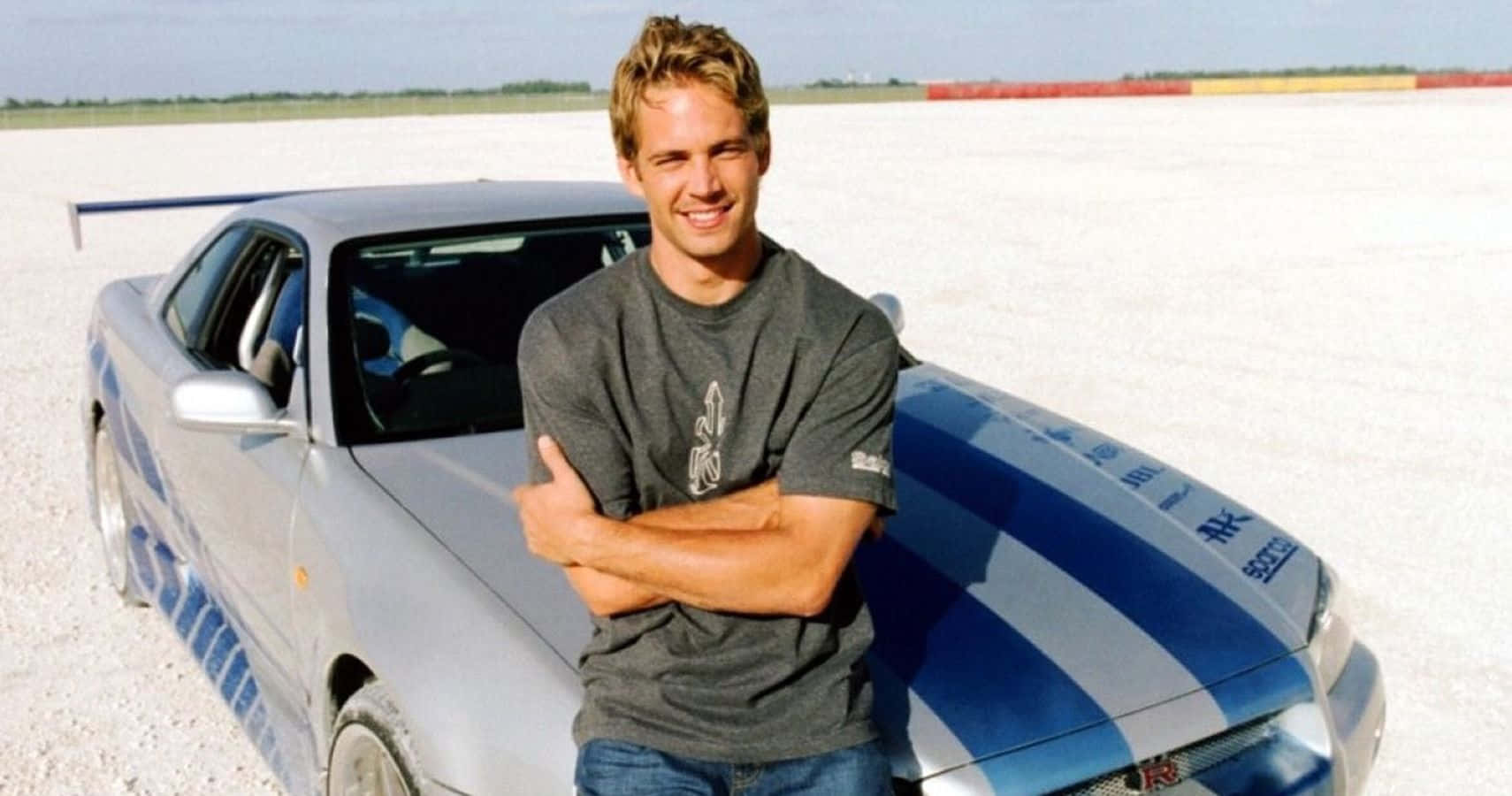 Paul Walker Behind The Wheel Of A Skyline Wallpaper