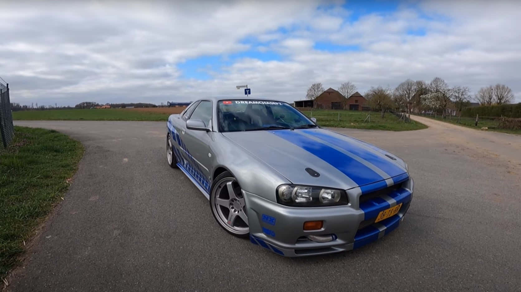 Paul Walker Drifts Through Downtown In A Nissan Skyline. Wallpaper