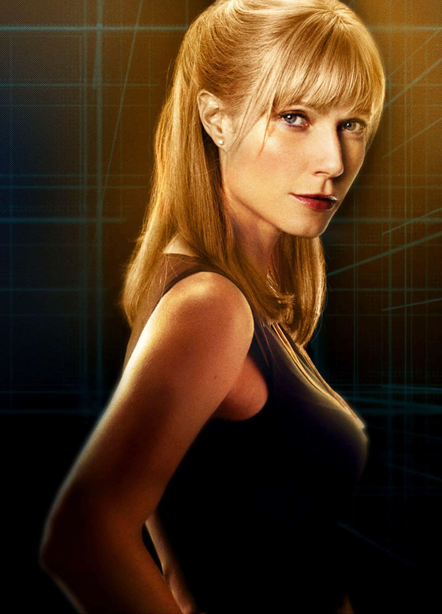 Pepper Potts Standing Confidently In Her Superhero Suit Wallpaper