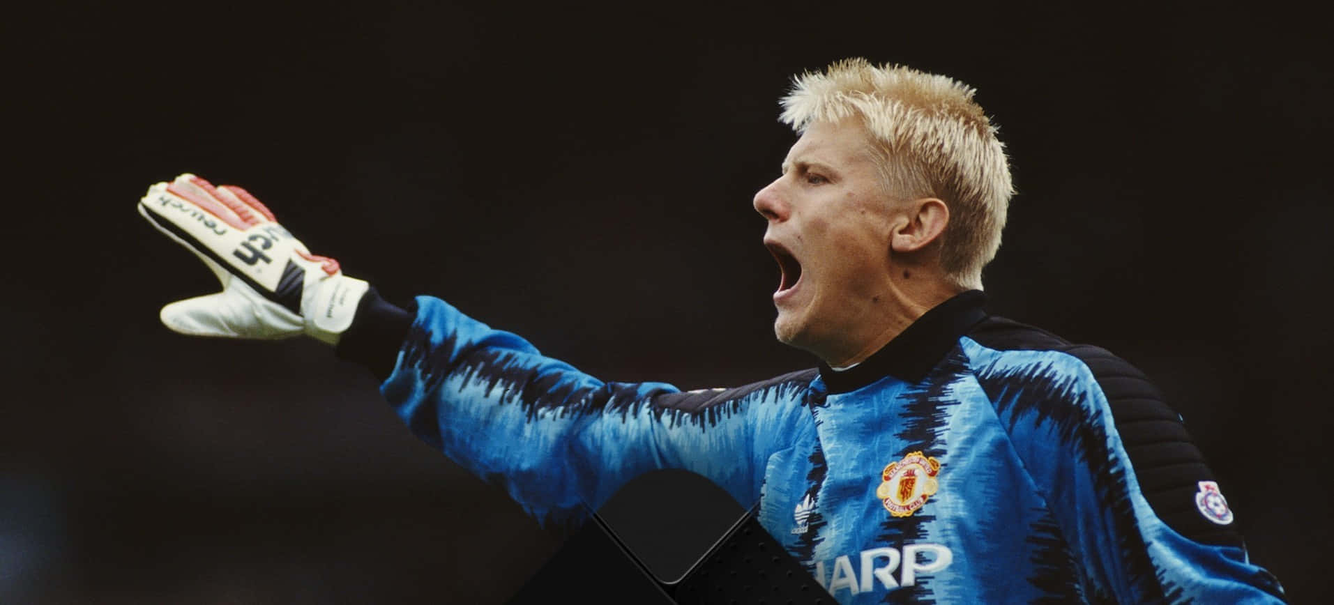 Peter Schmeichel Goalkeeper Poster Black Wallpaper