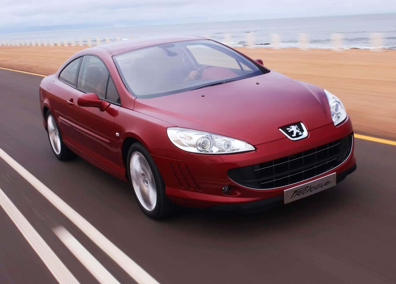 Peugeot 407 Driving On A Scenic Highway Wallpaper