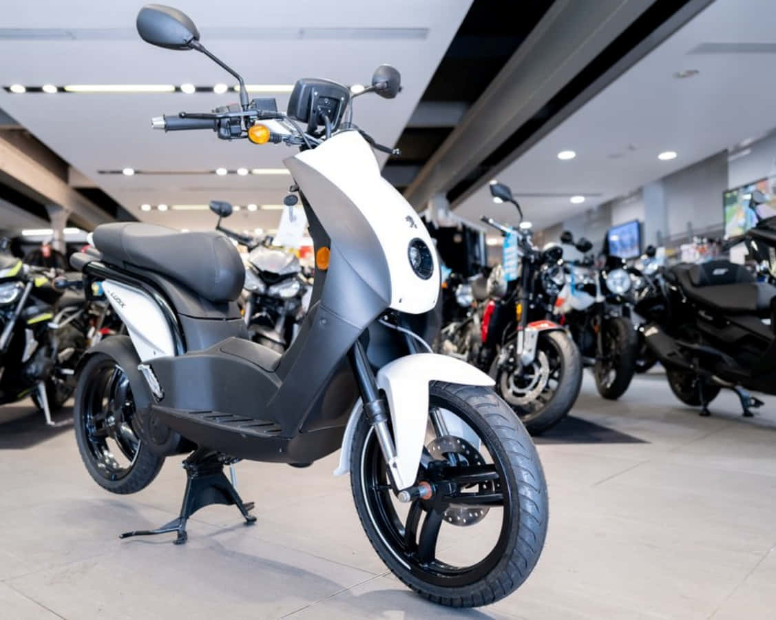 Peugeot Scooter Showroom Display Wallpaper