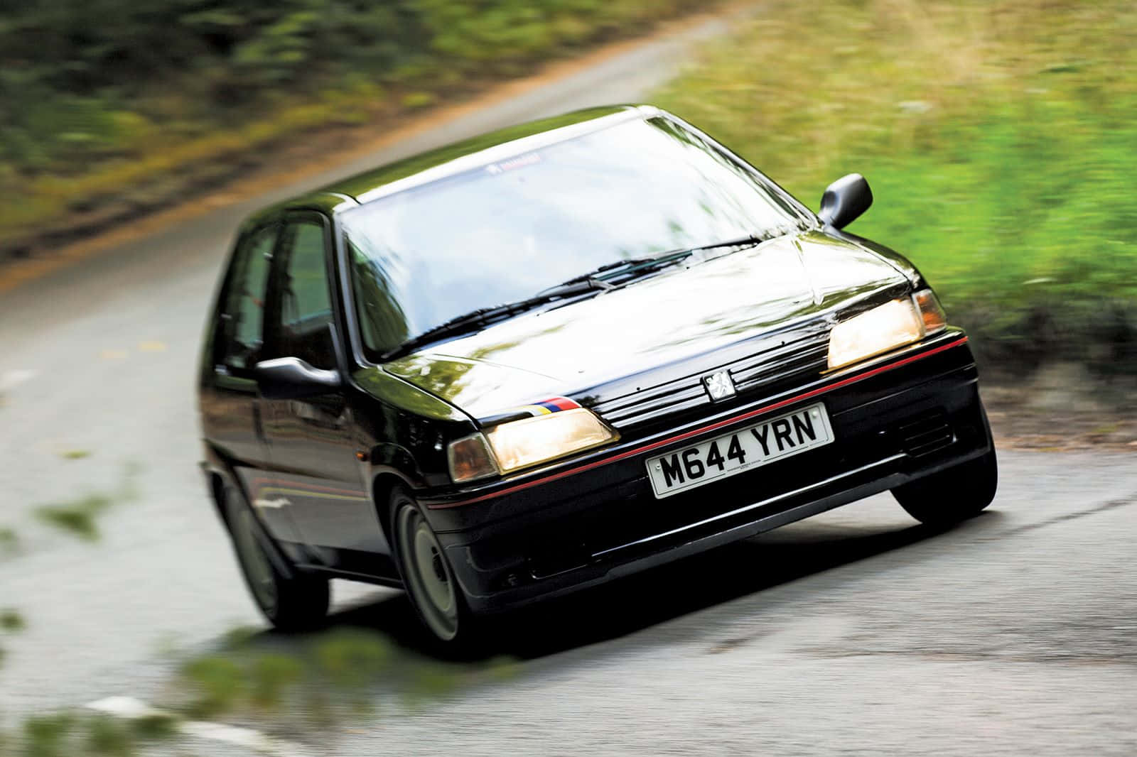 Peugeot106in Motion Wallpaper