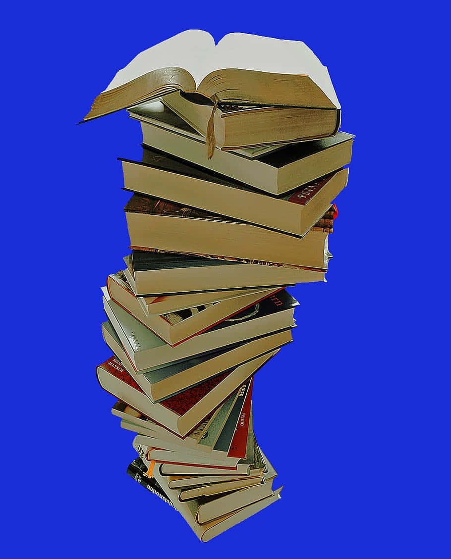 Piled Books For Eager Learning Wallpaper