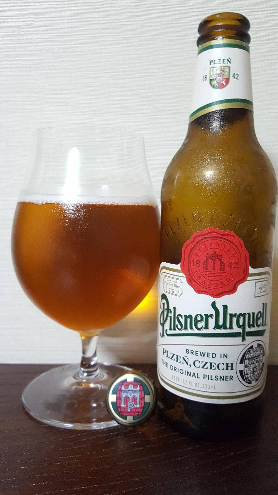 Pilsner Urquell Refreshment In Glass Wallpaper