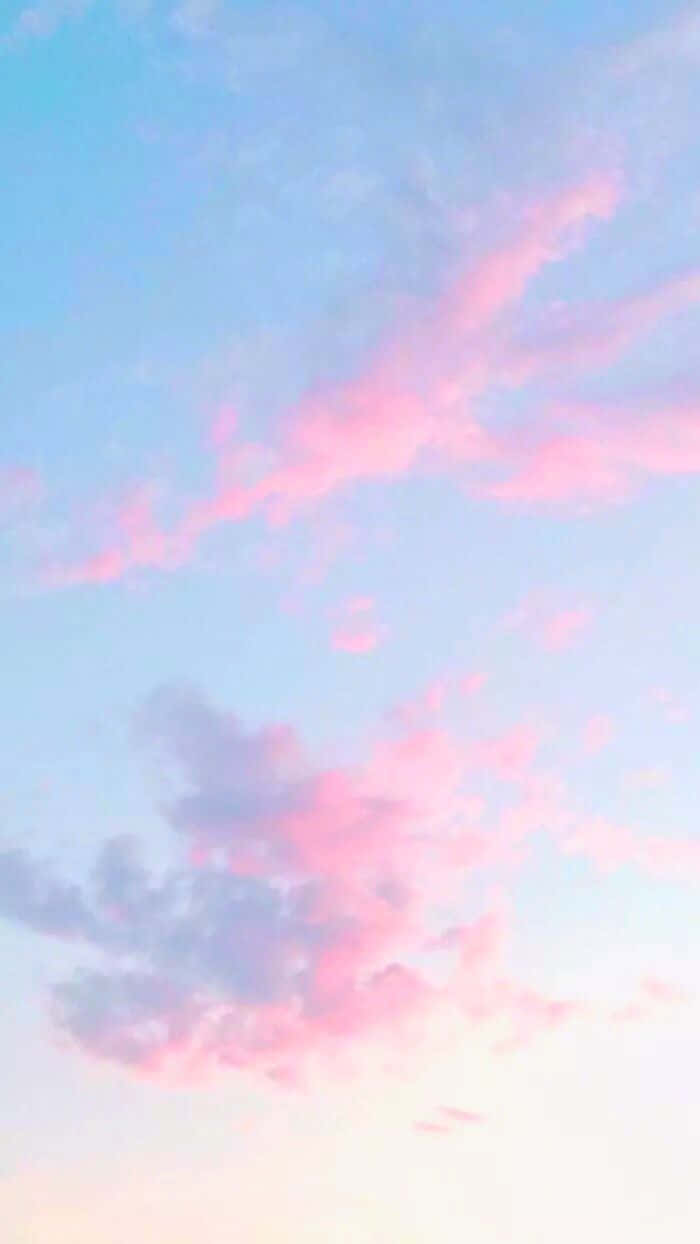 Pink And Blue Clouds In The Sky Wallpaper