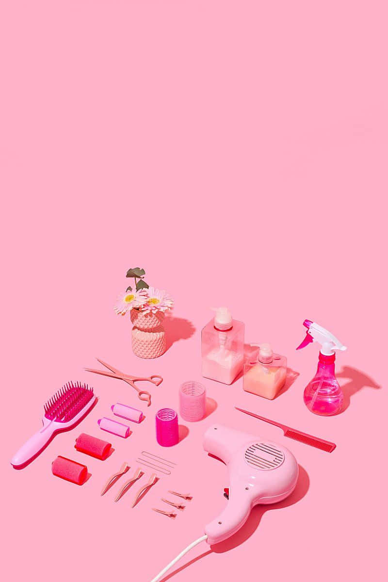 Pink Hair Stylist Tools Arrangement Wallpaper