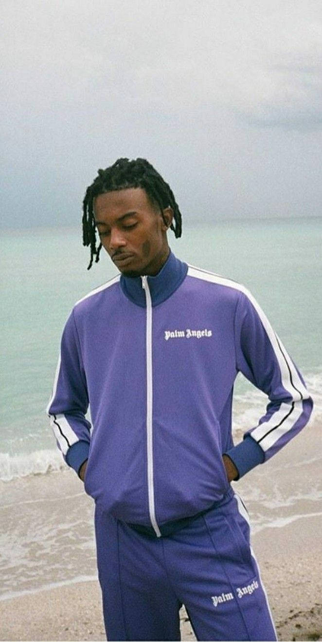 Playboi Carti Looking Stylish In Purple Tracksuit Wallpaper