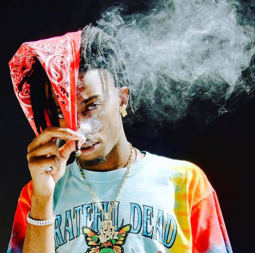 Playboi Carti Showcasing His Signature Style Wallpaper