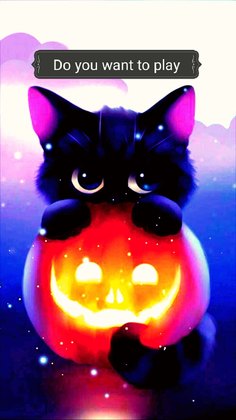 Playful Kitten Halloween Pumpkin Wallpaper