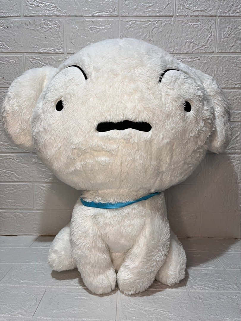 Plush White Dog Toy Sitting Wallpaper