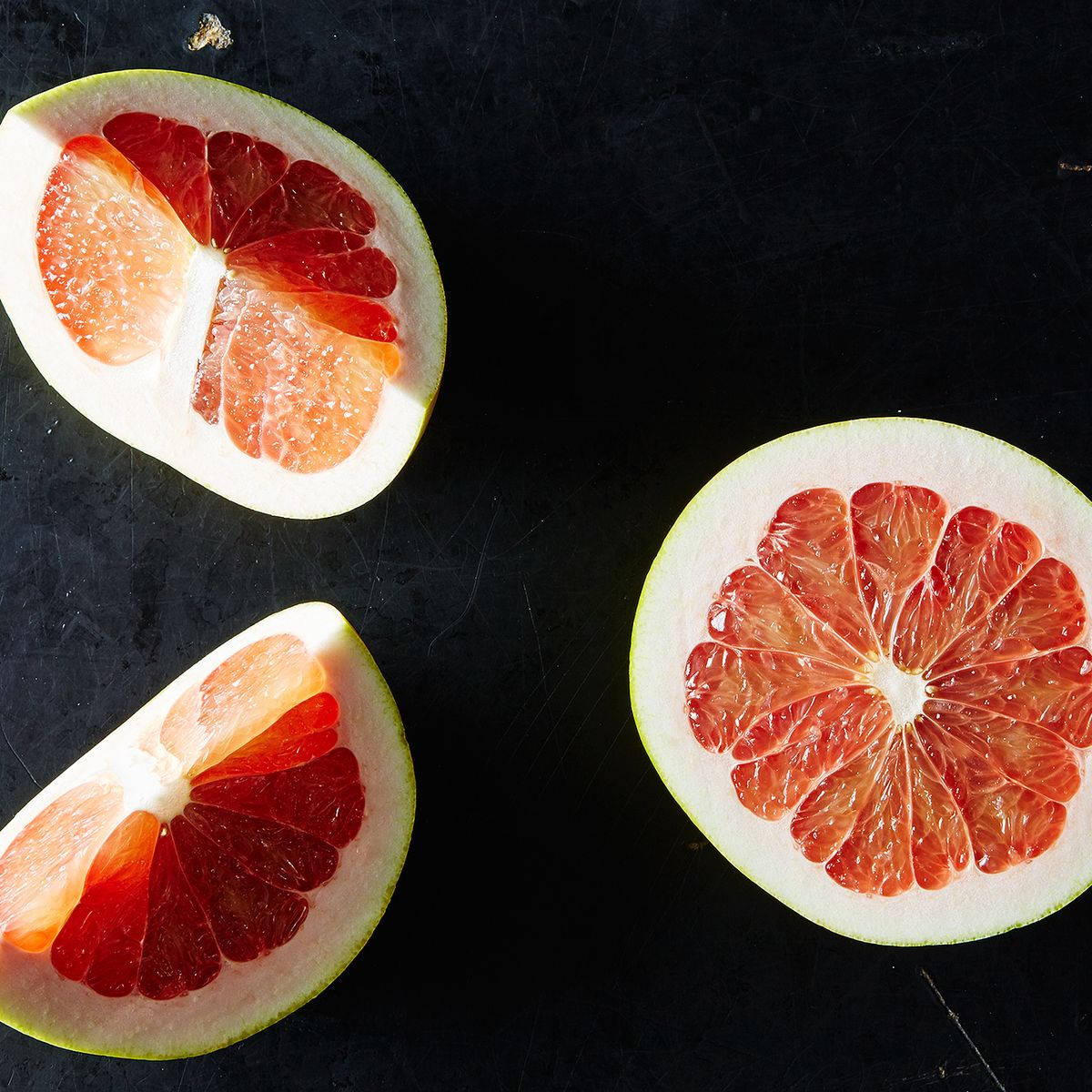 Pomelo Slices In Black Wallpaper