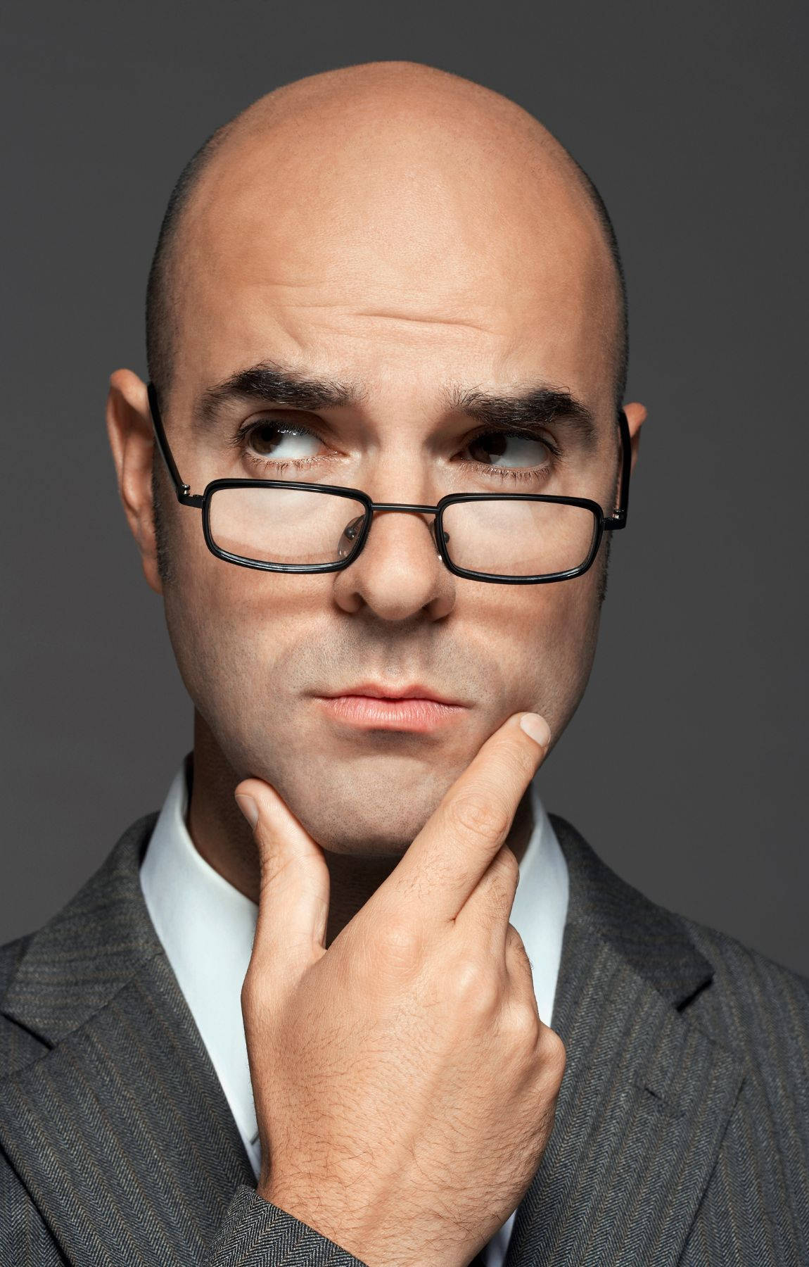 Portrait Of A Mature Bald Man In Glasses Wallpaper