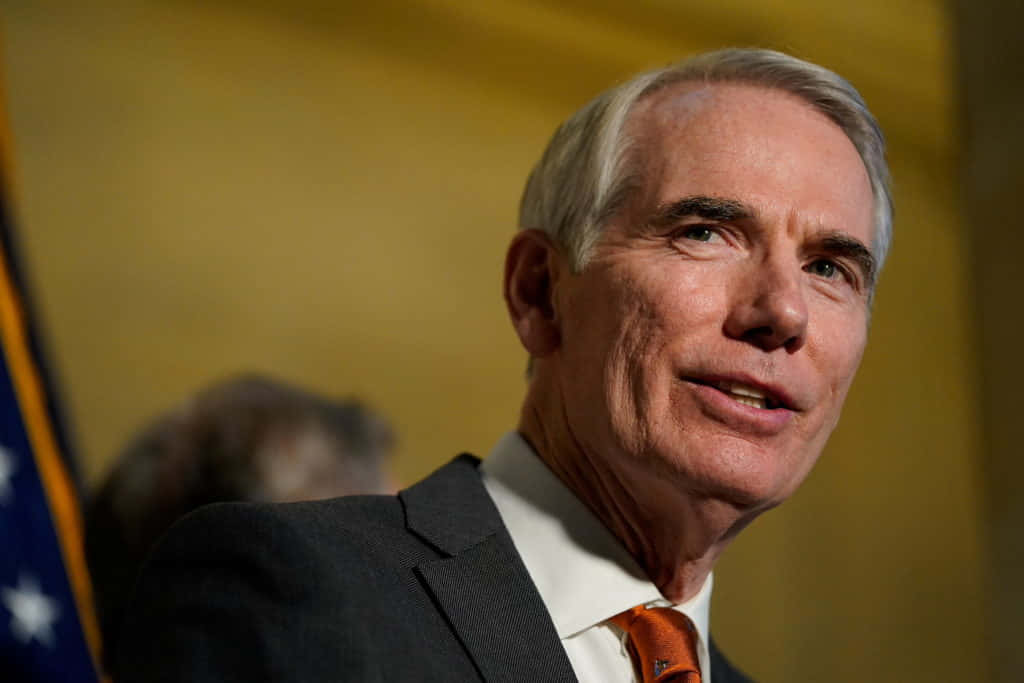 Portrait Of Rob Portman Against The Sky Wallpaper