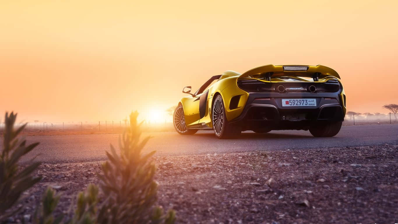 Power Unleashed - The Mclaren 675lt In Full Throttle Wallpaper