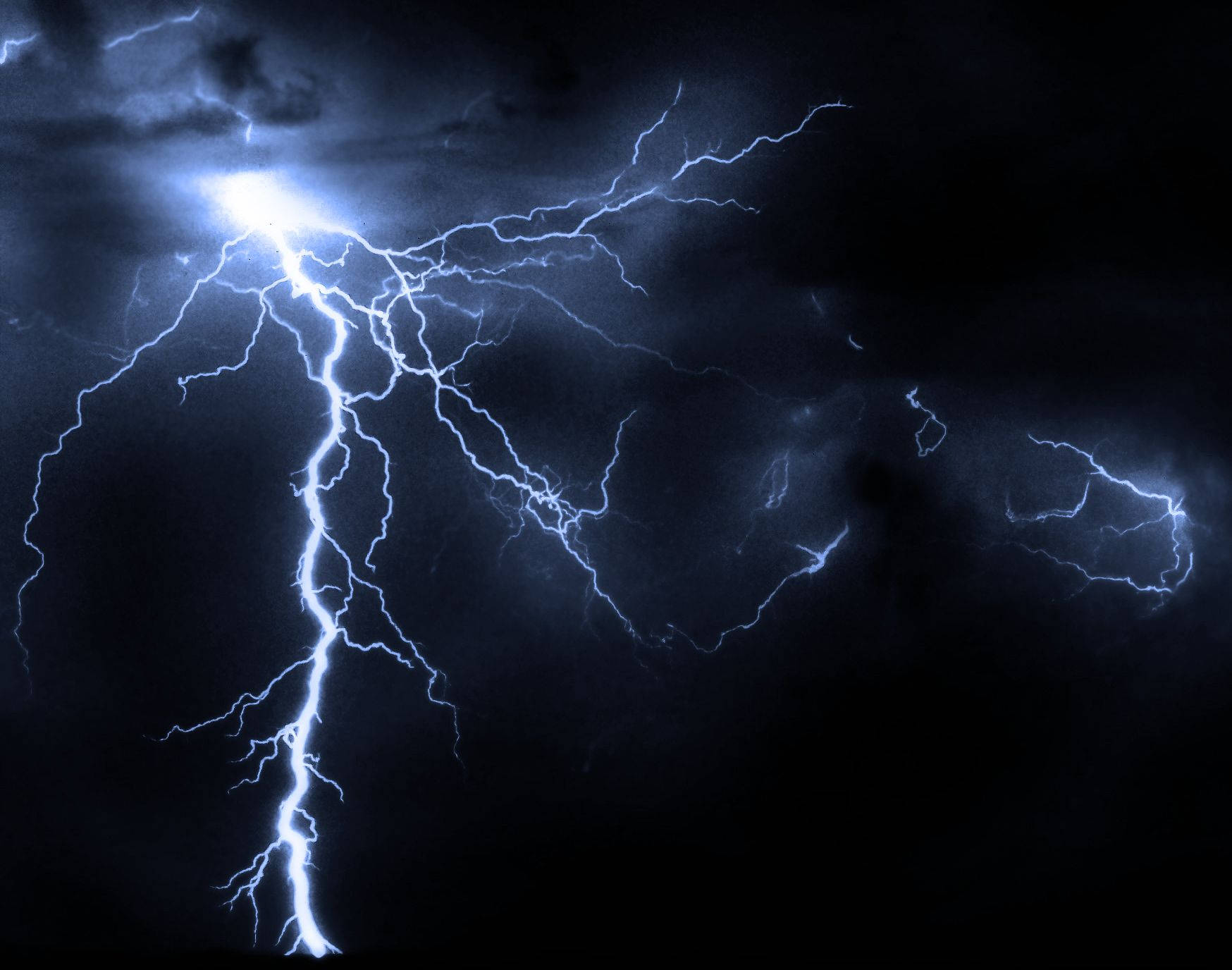 Powerful Bolt Of Lightning During A Stormy Night Wallpaper