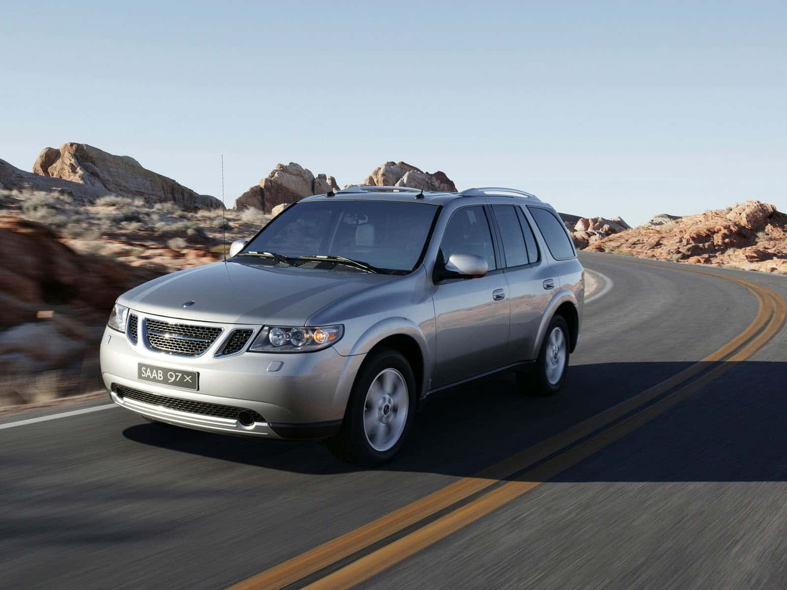 Powerful Elegance: The Saab 9-7x On The Road Wallpaper