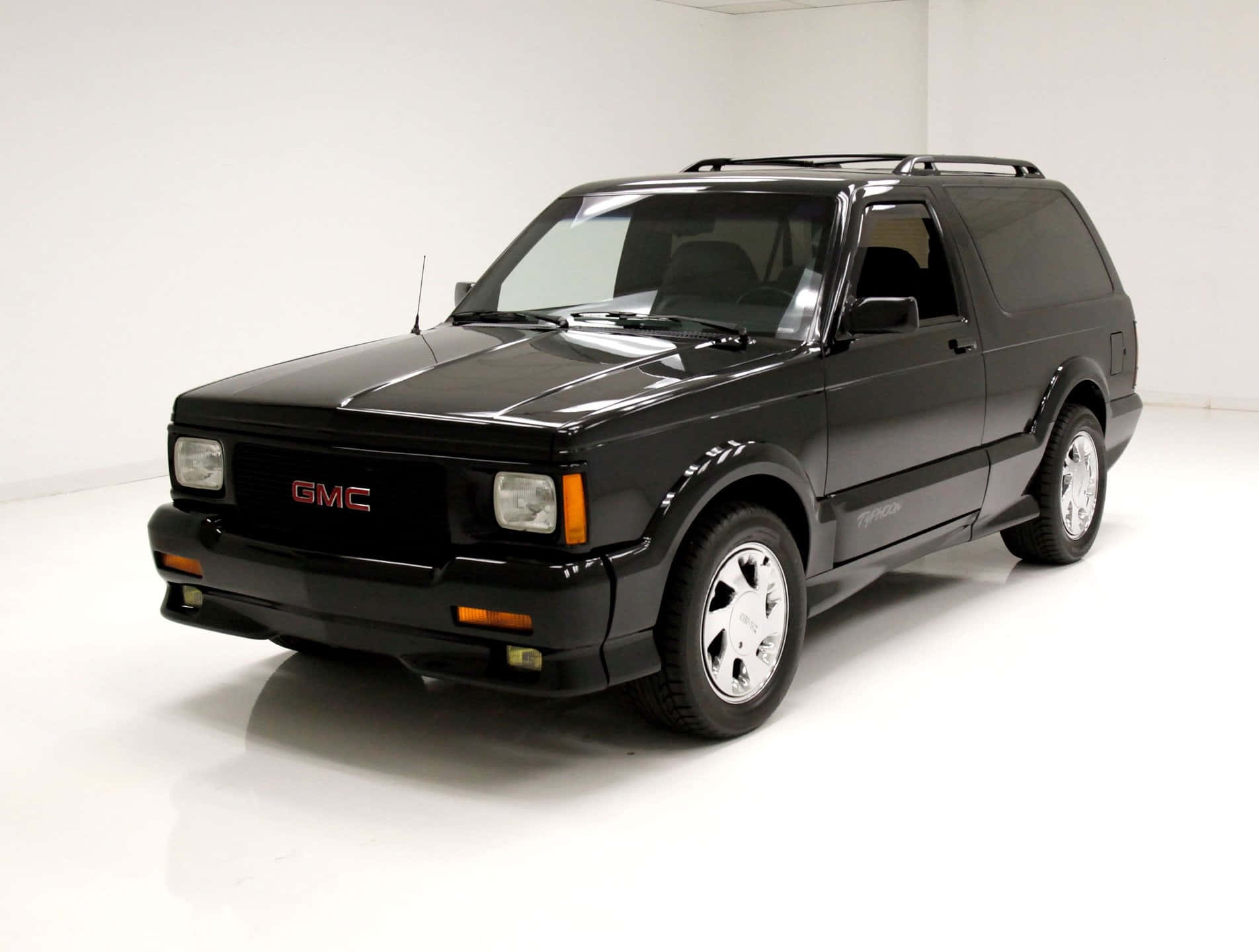 Powerful Gmc Typhoon In Action Wallpaper