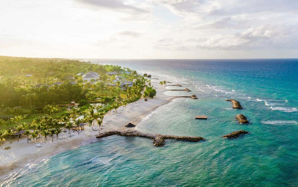 Powerful Waves On A Pristine Jamaican Beach Wallpaper