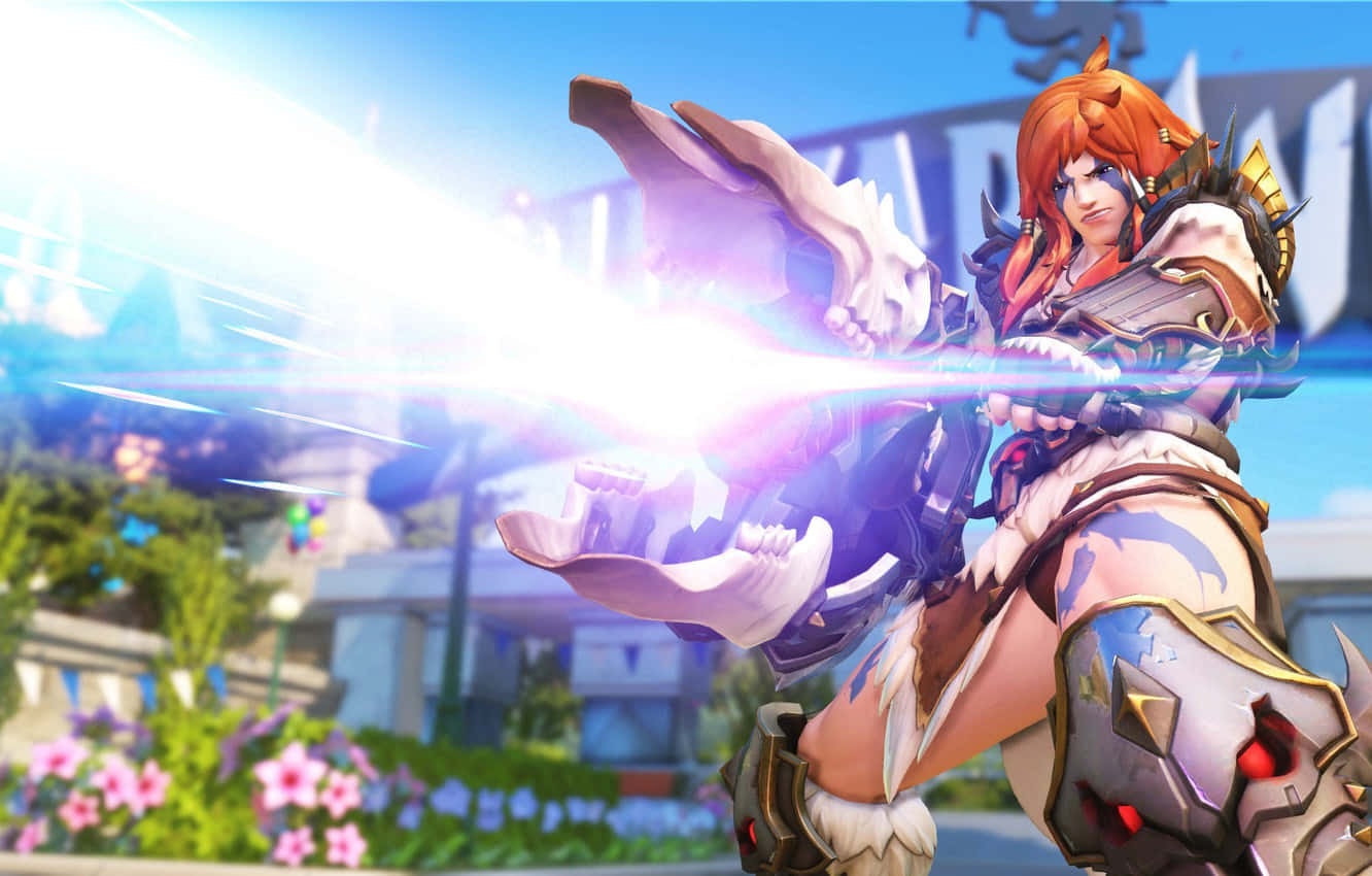 Powerful Zarya Dominating The Battlefield In Overwatch Wallpaper