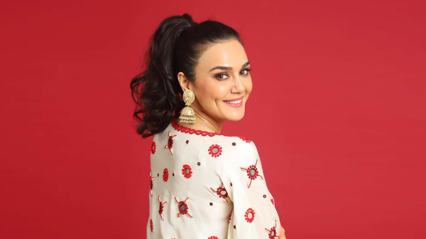 Preity Zinta Red Background Wallpaper